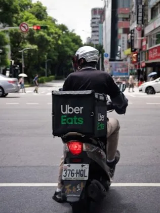 Delivery courier carrying an order